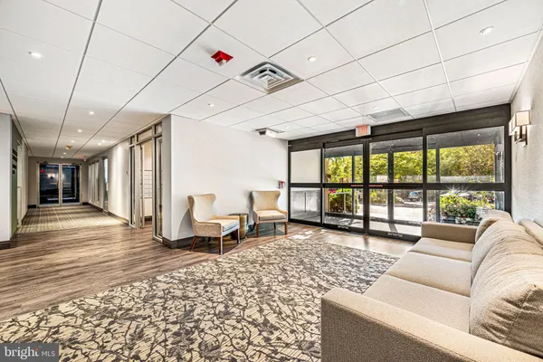a living room with large windows