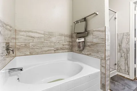 a view of livingroom with furniture and windows