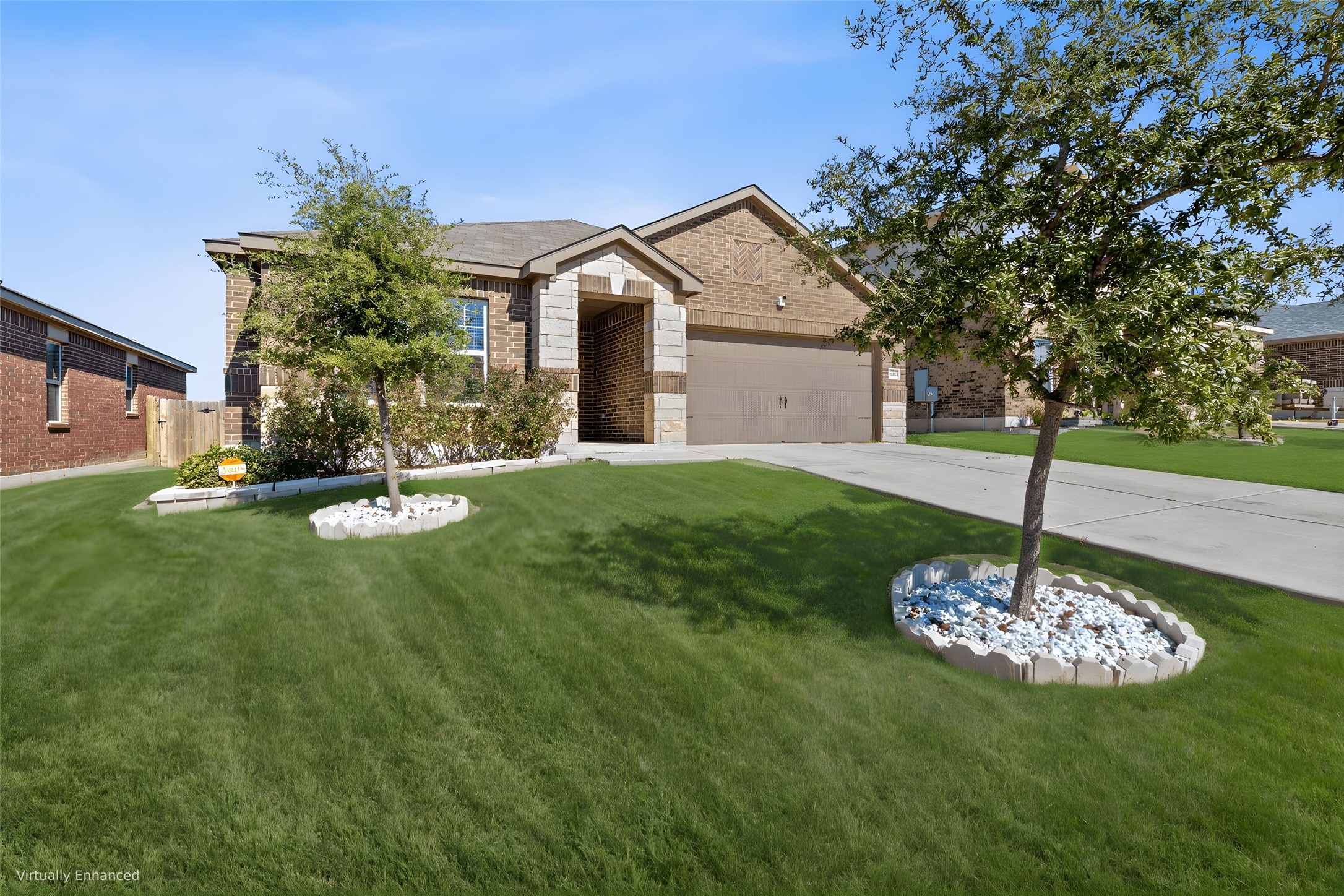 19212 Andrew Jackson Street Manor, TX 78653 - Photo 2 of 35 a front view of a house with a yard