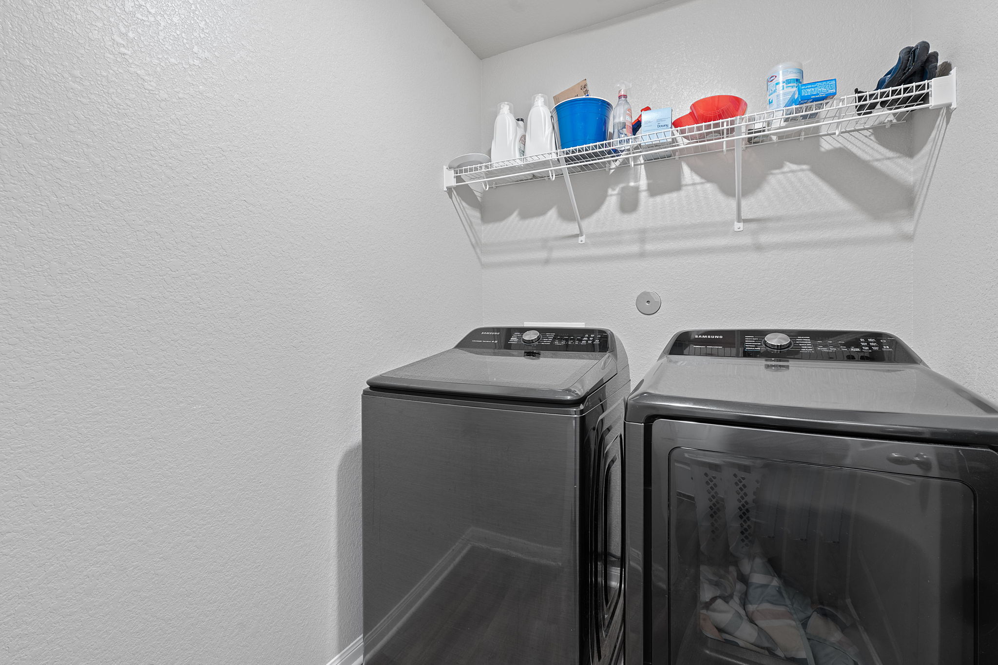 19212 Andrew Jackson Street Manor, TX 78653 - Photo 23 of 35 a utility room with dryer and washer