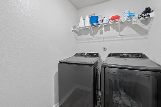 an aerial view of a house and outdoor space