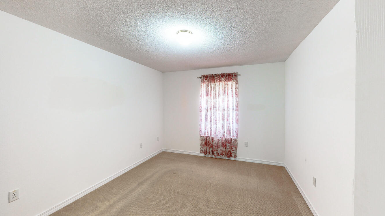 4787 Ribault Lane Milton, FL 32570 - Photo 25 of 36 an empty room with windows