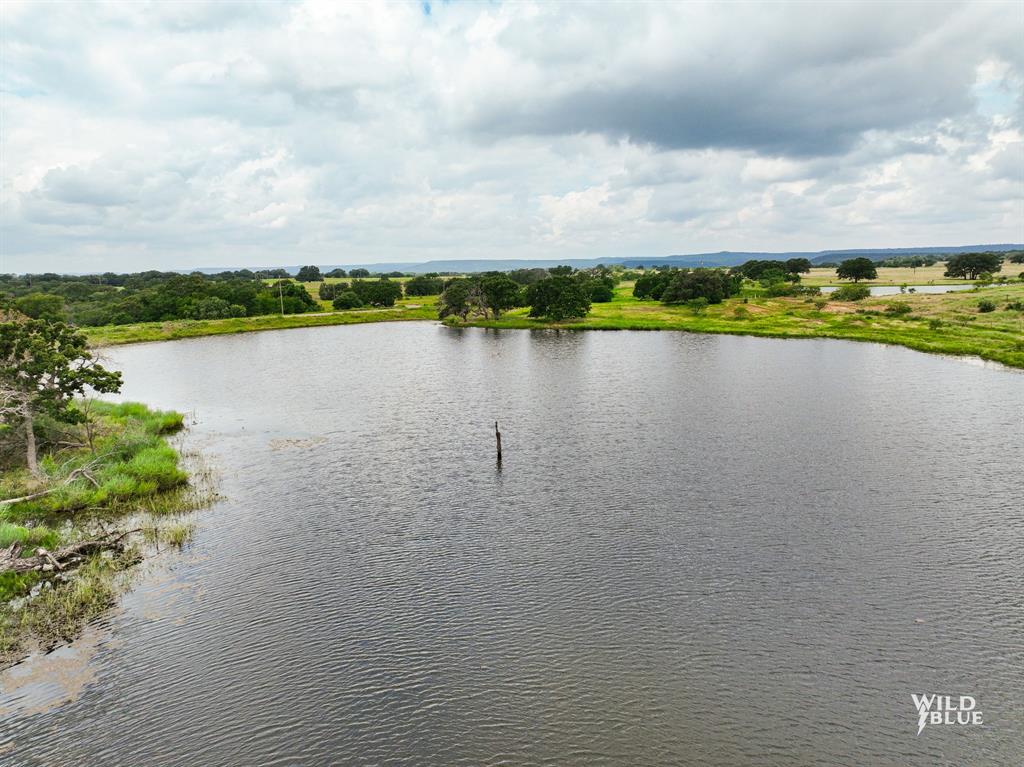 2170 River Shls Road Mineral Wells, TX 76067 - Photo 11 of 40 a view of a lake with houses in the back