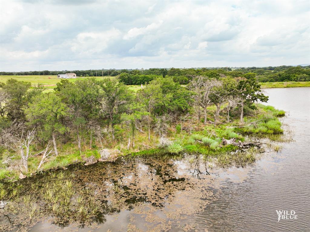 2170 River Shls Road Mineral Wells, TX 76067 - Photo 18 of 40 a view of lake with beach