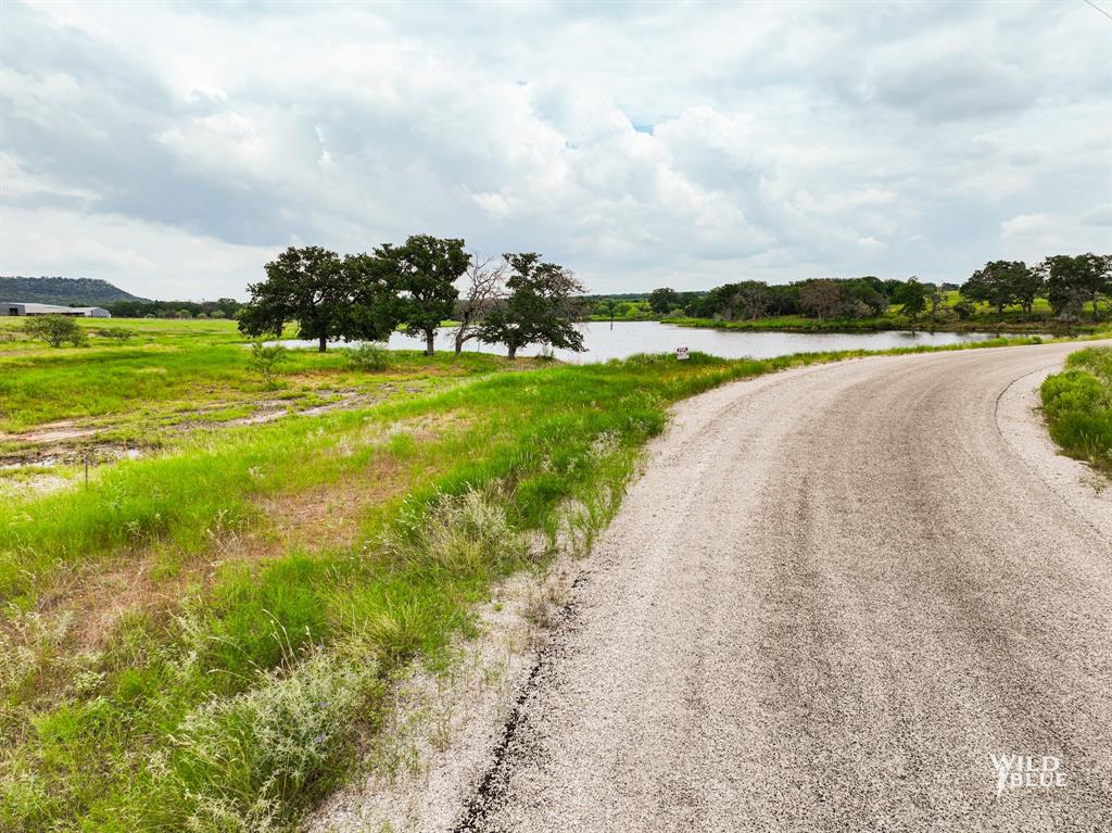 2170 River Shls Road Mineral Wells, TX 76067 - Photo 27 of 40 a view of a lake with houses in the back