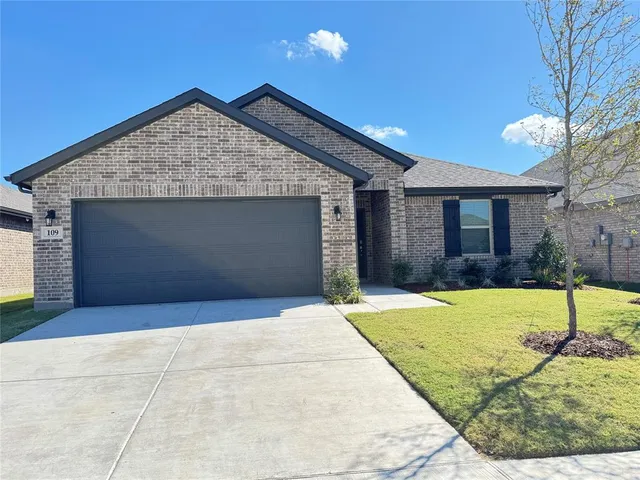 a view of outdoor space yard and garage
