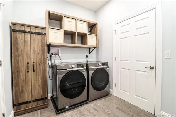 a utility room with dryer and washer