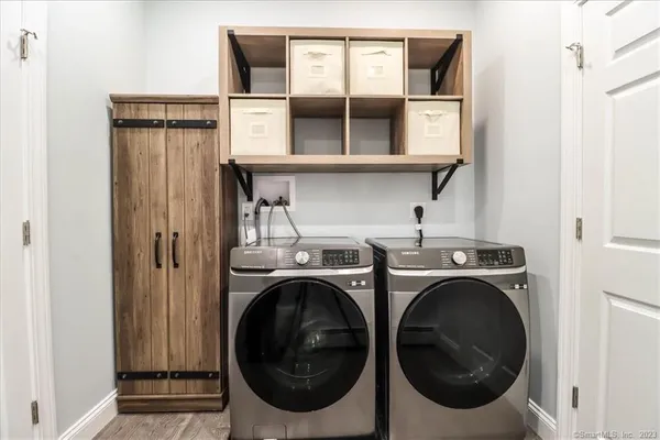 a utility room with dryer and washer