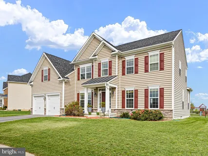 front view of a house and a yard
