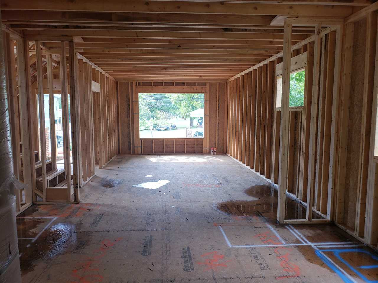 16 Hill Street Raleigh, NC 27610 - Photo 15 of 25 Looking into the Dining/Living space from the Kitchen area Downstairs Living Space