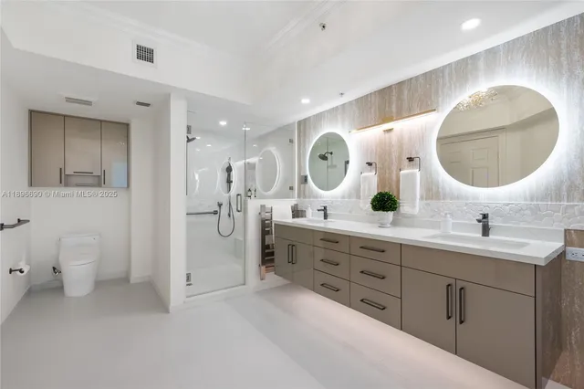 a spacious bathroom with a double vanity sink and a mirror