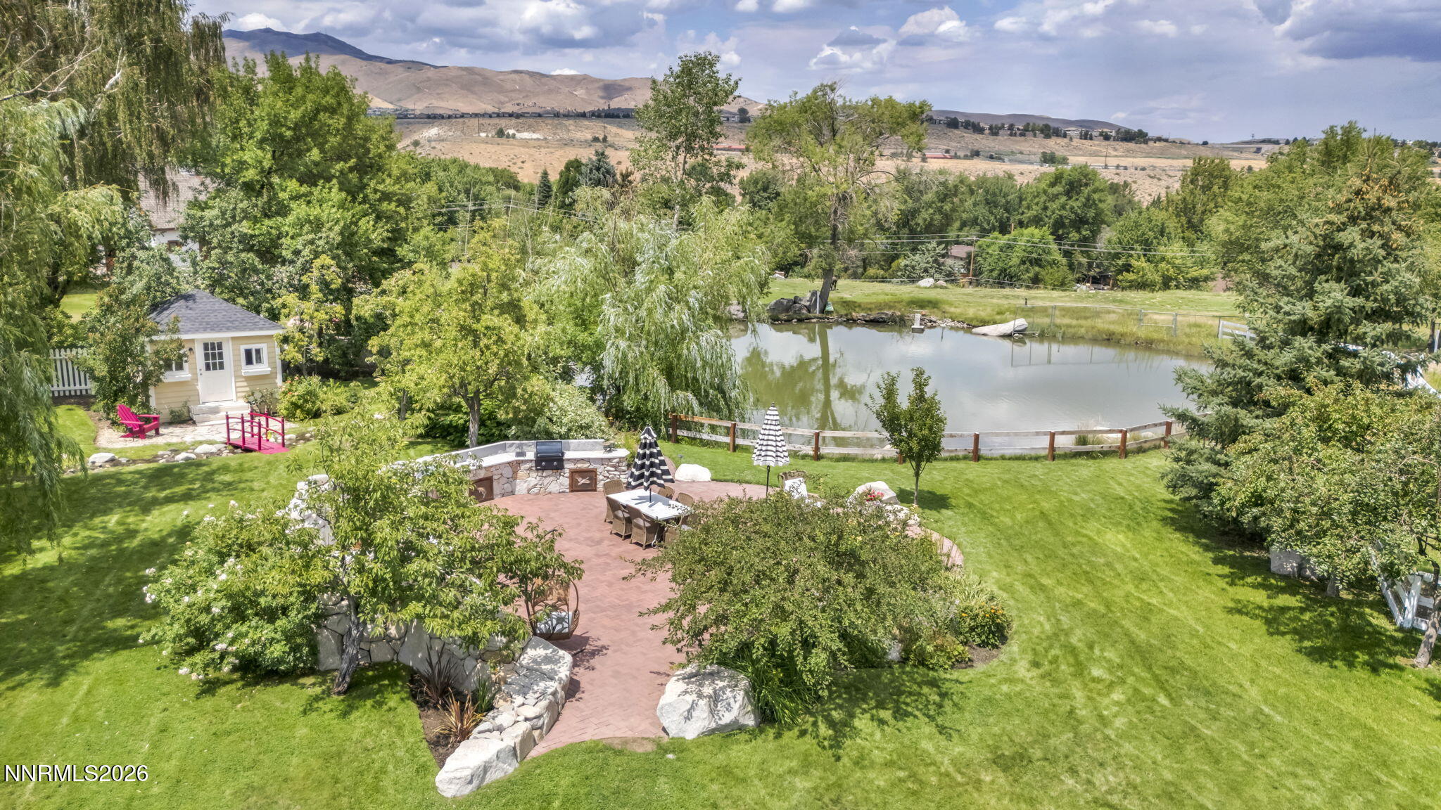 4010 Canyon Drive Reno, NV 89519 - Photo 28 of 147 a view of a lake with a house in a yard