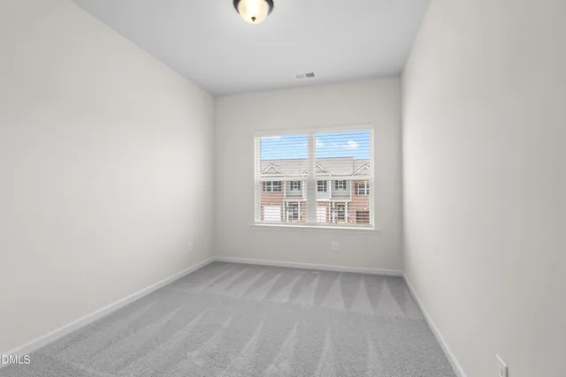 an empty room with closet