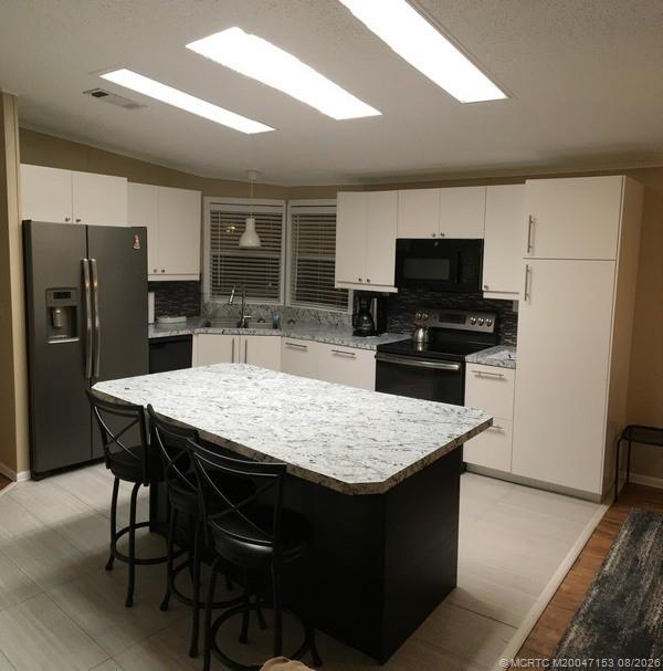 14514 Southwest Rake Drive Indiantown, FL 34956 - Photo 6 of 11 Gallery Image 6