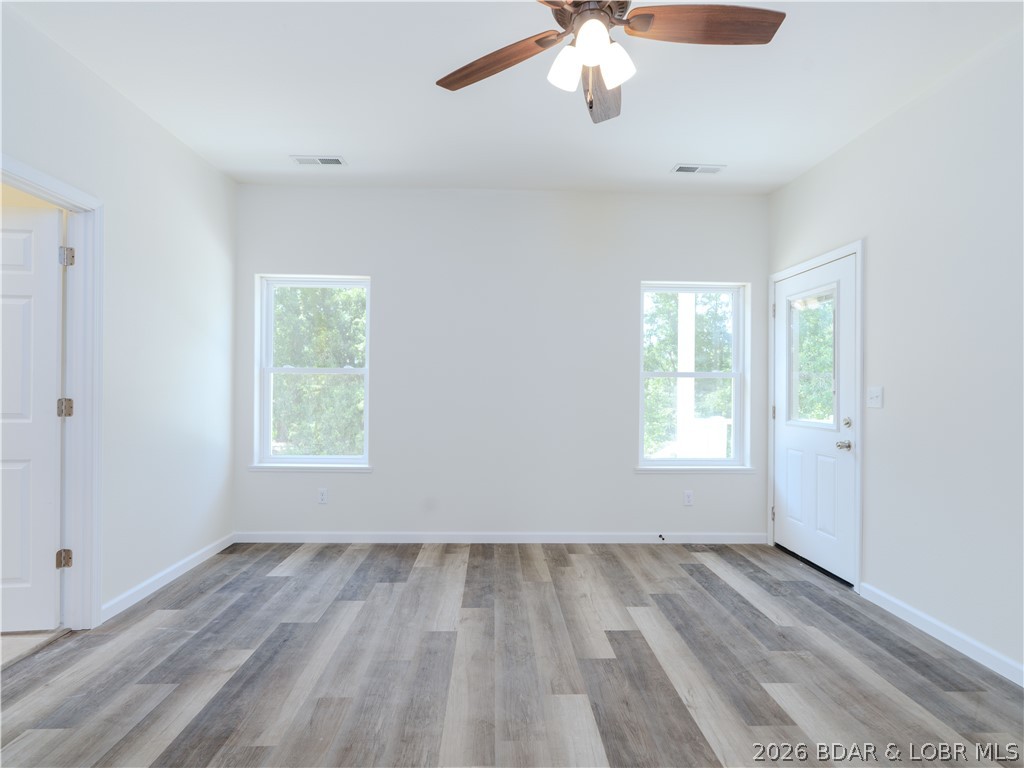7 Oak Tree Lane Eldon, MO 65026 - Photo 20 of 59 Master bedroom all LVP flooring (no carpet)