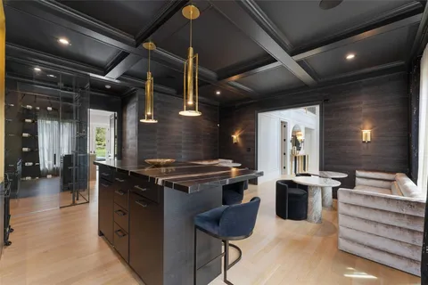 a kitchen with stainless steel appliances granite countertop a stove and a sink