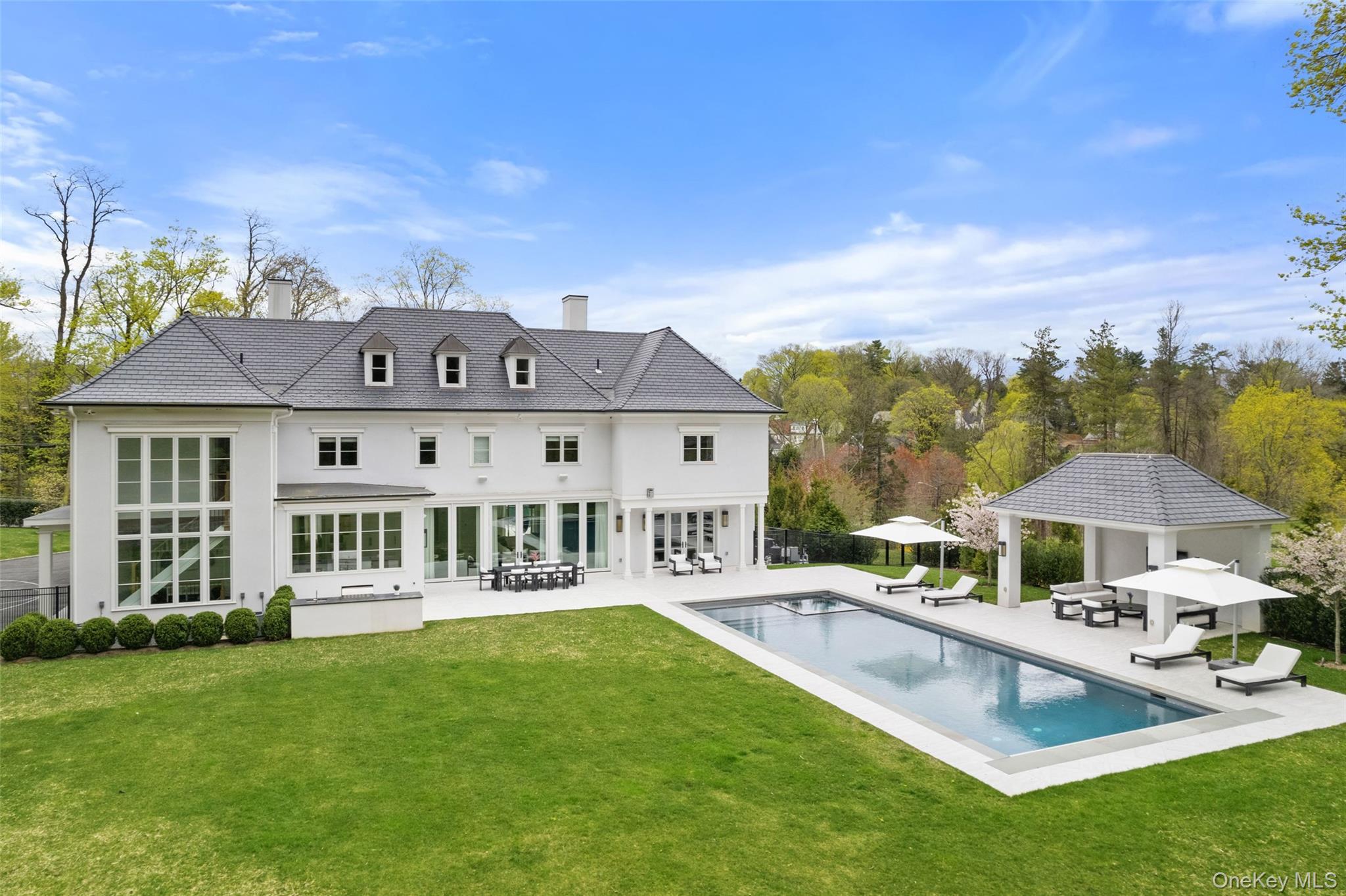 17 Oxford Road Scarsdale, NY 10583 - Photo 2 of 49 Built in 2021 this magnificent estate is situated on 1.2 acres of level property with pool and cabana
