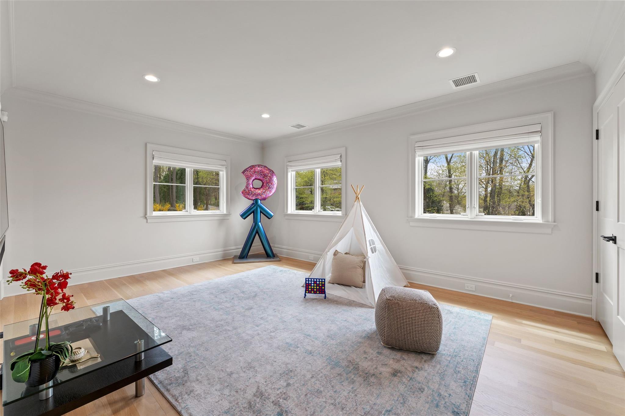 17 Oxford Road Scarsdale, NY 10583 - Photo 30 of 49 a living room with furniture and a window
