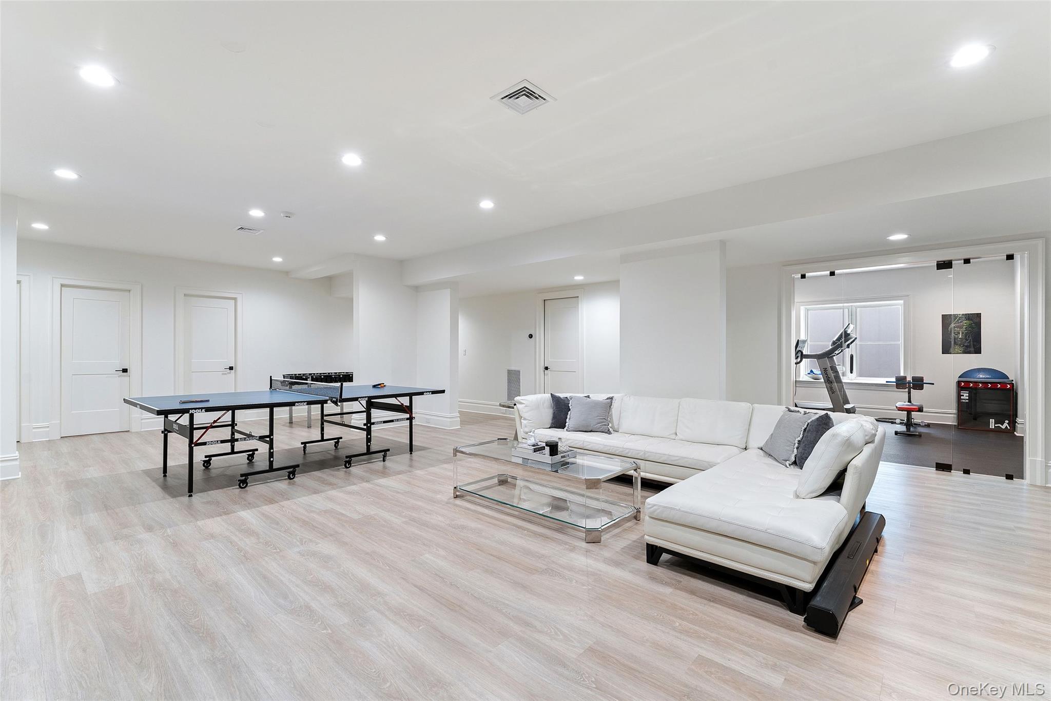 17 Oxford Road Scarsdale, NY 10583 - Photo 31 of 49 Fun and games await in the lower level with 9 foot ceilings
