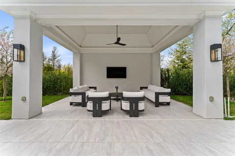 a view of a livingroom with furniture and garden