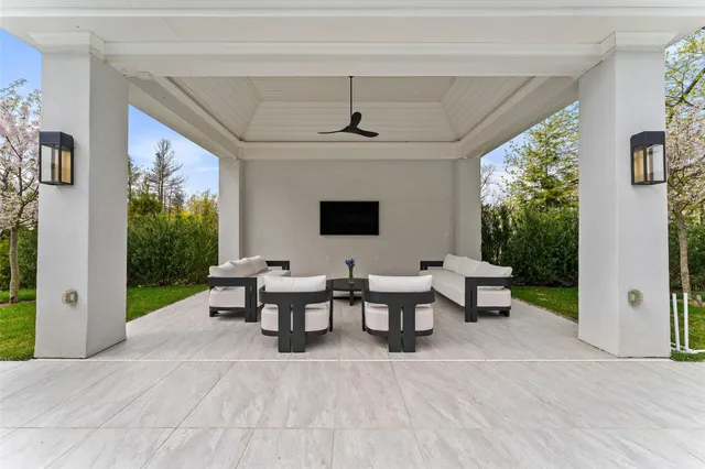 a view of a livingroom with furniture and garden