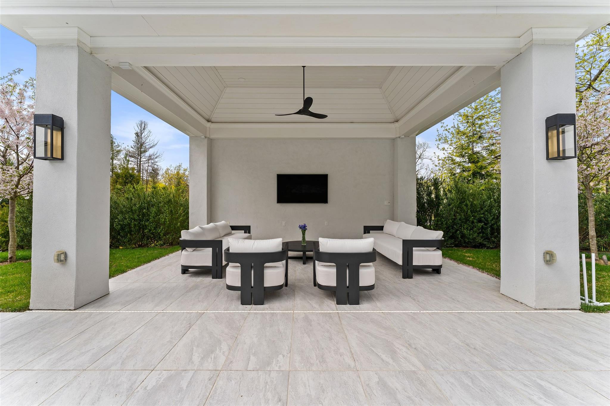 17 Oxford Road Scarsdale, NY 10583 - Photo 37 of 49 a view of a livingroom with furniture and garden