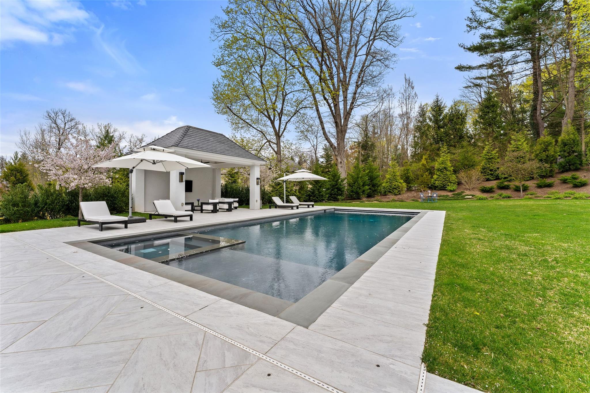 17 Oxford Road Scarsdale, NY 10583 - Photo 38 of 49 a view of outdoor space yard swimming pool and patio
