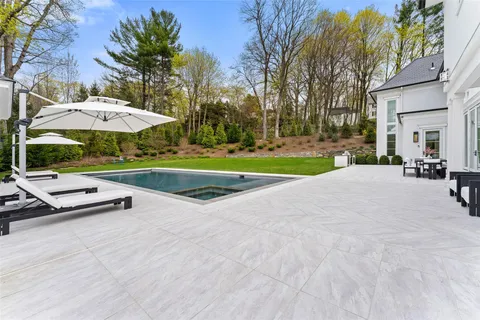 a view of a park with large trees