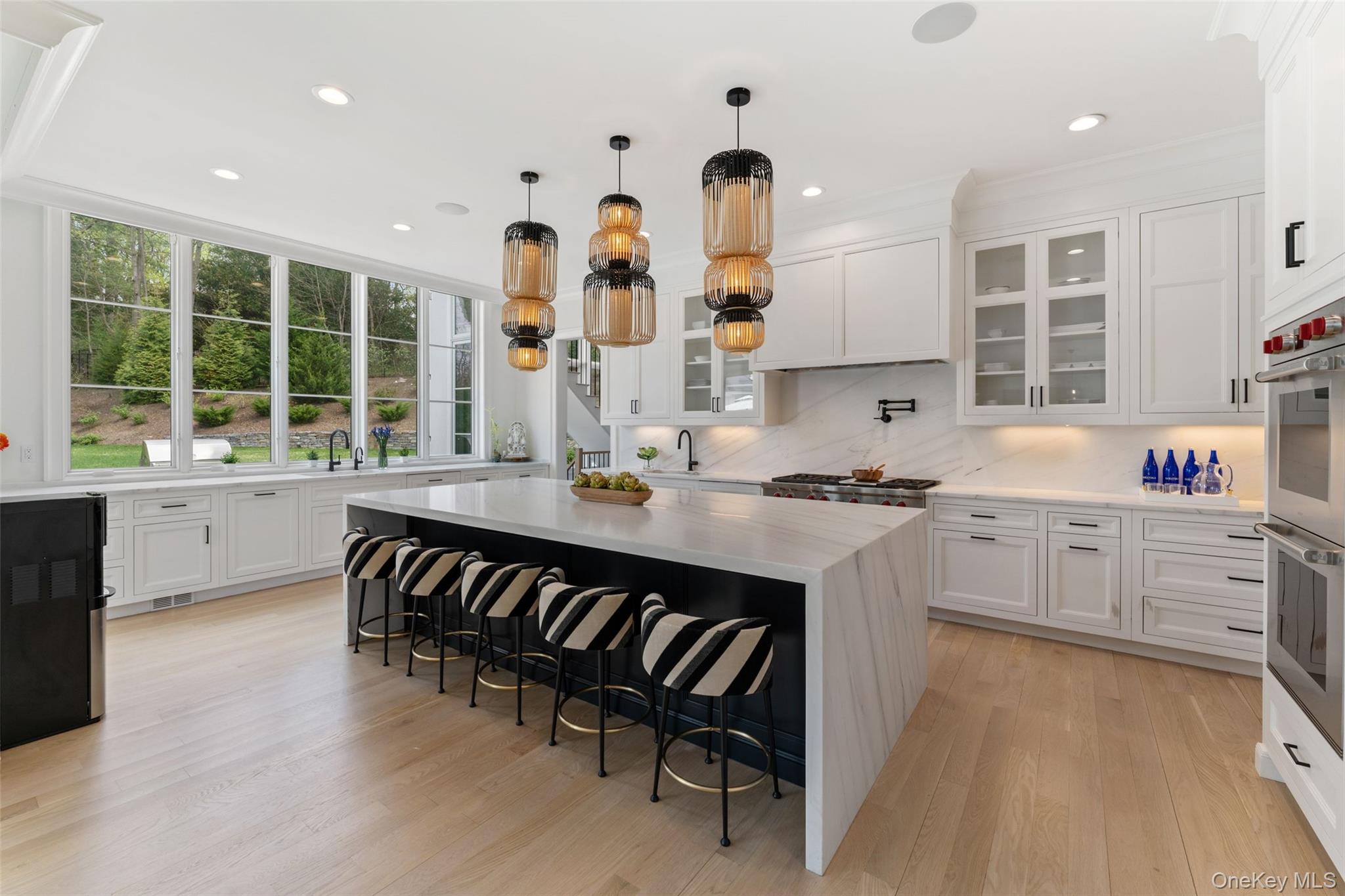 17 Oxford Road Scarsdale, NY 10583 - Photo 4 of 49 Stunning open kitchen with massive waterfall marble island