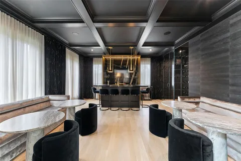 a kitchen with stainless steel appliances kitchen island granite countertop lots of counter top space