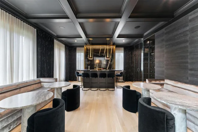 a kitchen with stainless steel appliances kitchen island granite countertop lots of counter top space