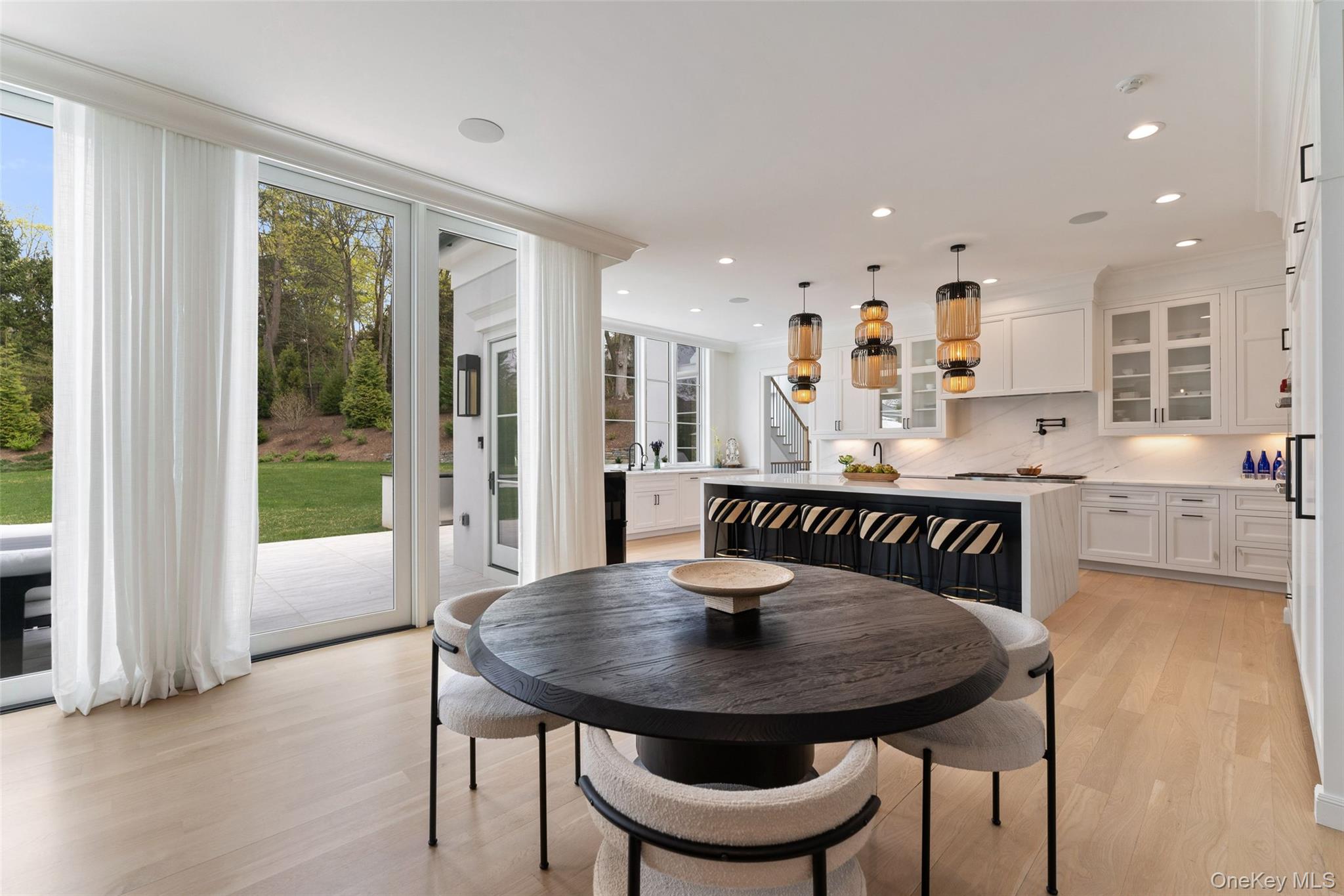 17 Oxford Road Scarsdale, NY 10583 - Photo 8 of 49 Breakfast area open to the kitchen and family room