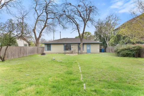 a house view with a garden space
