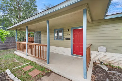 a view of a porch with a bench