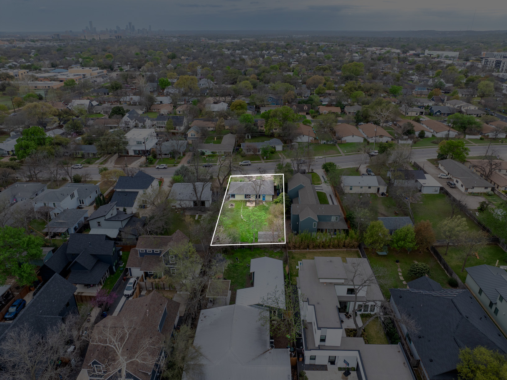 1900 Justin Lane Austin, TX 78757 - Photo 27 of 27 Aerial perspective of suburban area with property parcel outlined