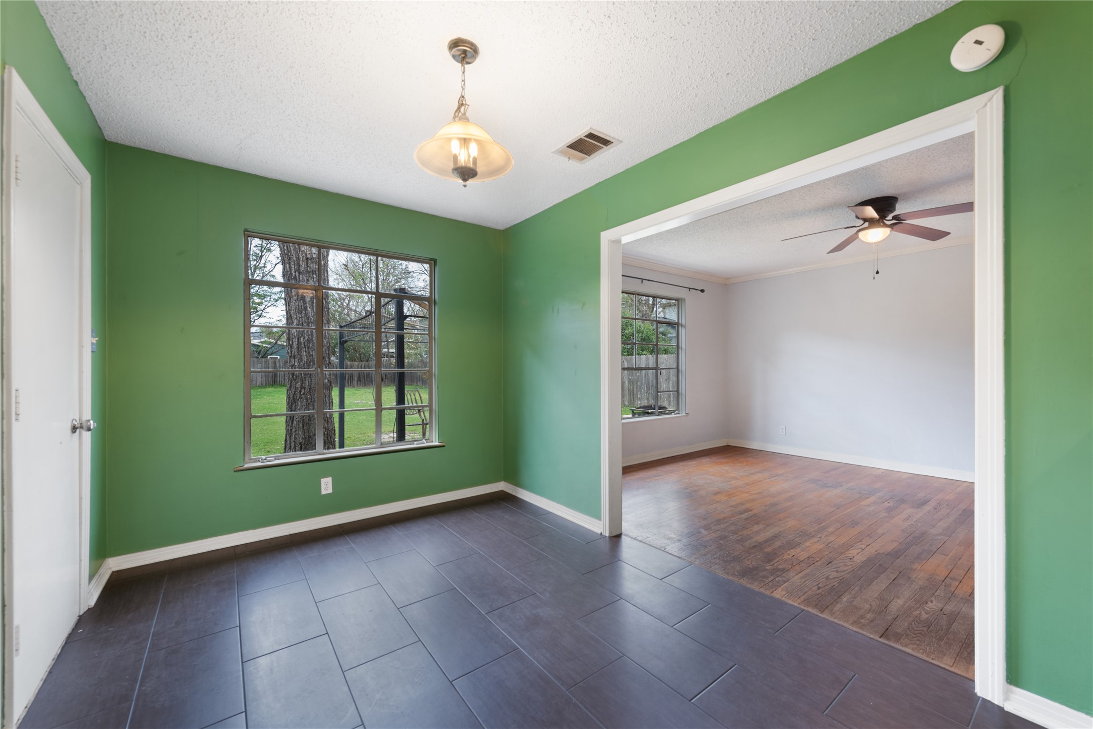 1900 Justin Lane Austin, TX 78757 - Photo 6 of 27 Empty room with a textured ceiling and ceiling fan