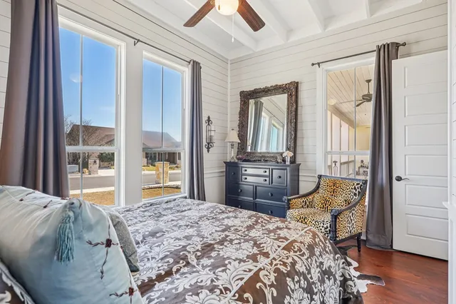 a bathroom with a double vanity sink mirror and toilet