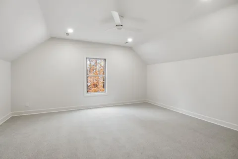 a picture of a bathroom with a shower