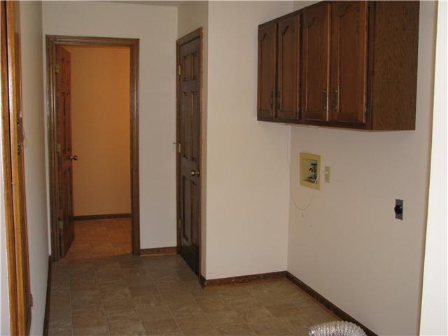 307 Mosley Drive Springfield, TN 37172 - Photo 8 of 14 If you enter from the attached garage you come into the big laundry area complete with cabinets & built-in ironing board!