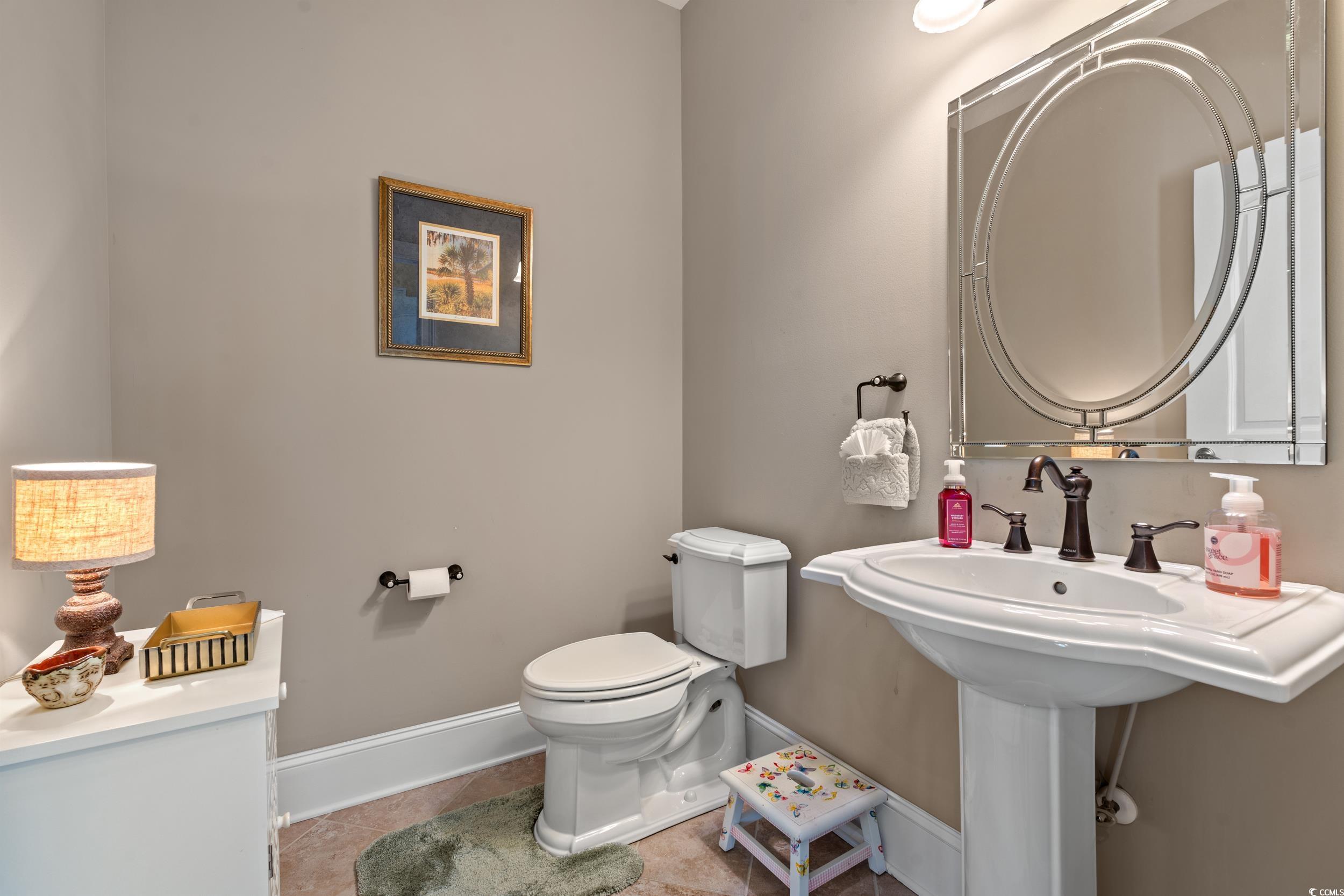 3609 Long Ave Extension Conway, SC 29526 - Photo 15 of 40 Half bathroom featuring baseboards and light tile patterned flooring