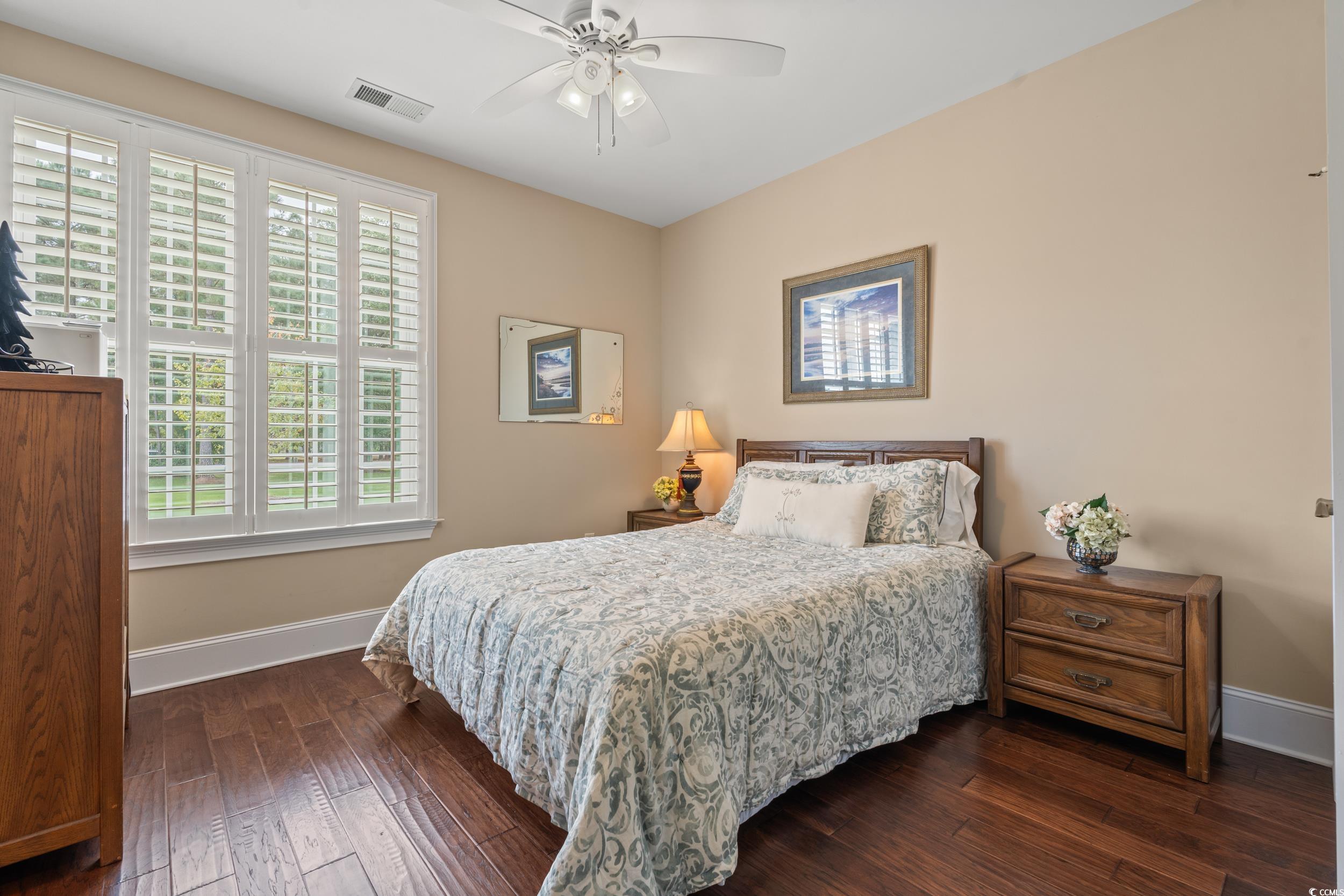 3609 Long Ave Extension Conway, SC 29526 - Photo 21 of 40 Bedroom with dark wood-style flooring and a ceiling fan