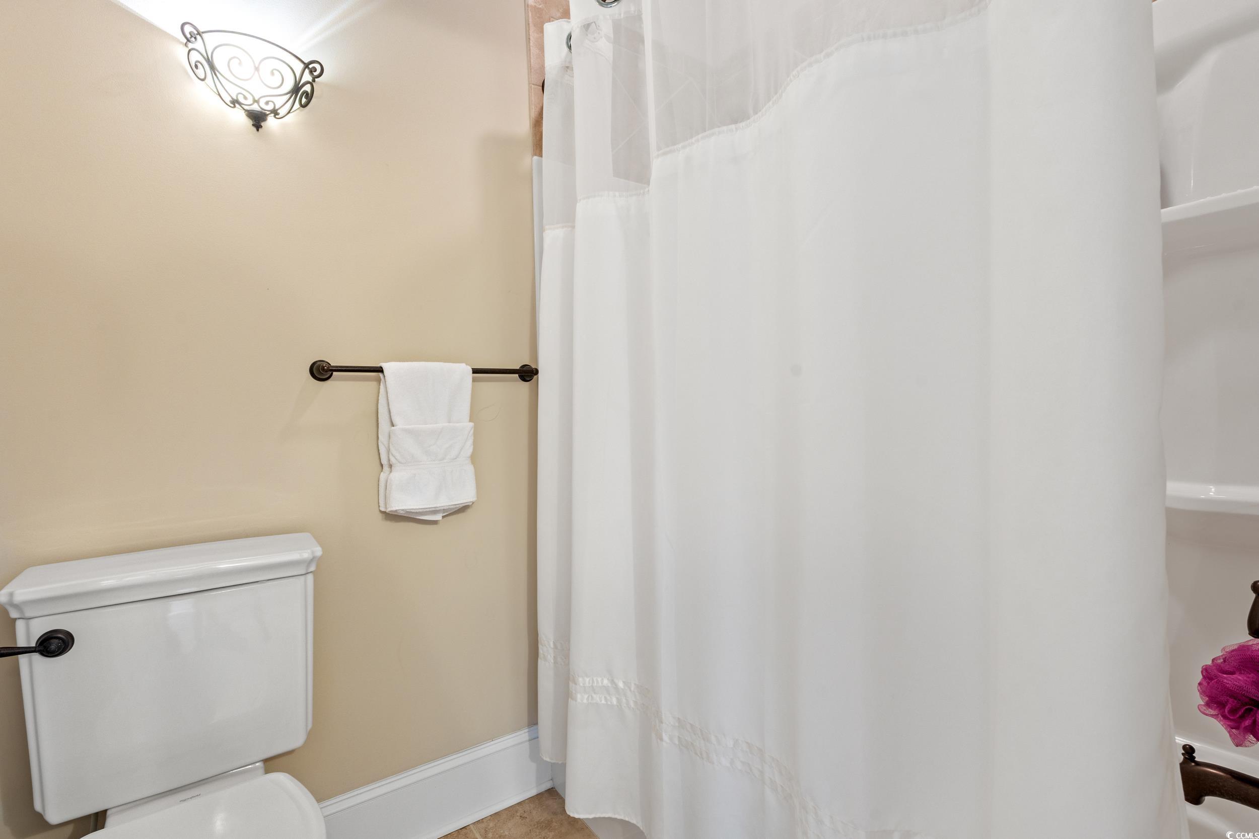 3609 Long Ave Extension Conway, SC 29526 - Photo 24 of 40 Full bathroom featuring a shower with curtain and tile patterned floors