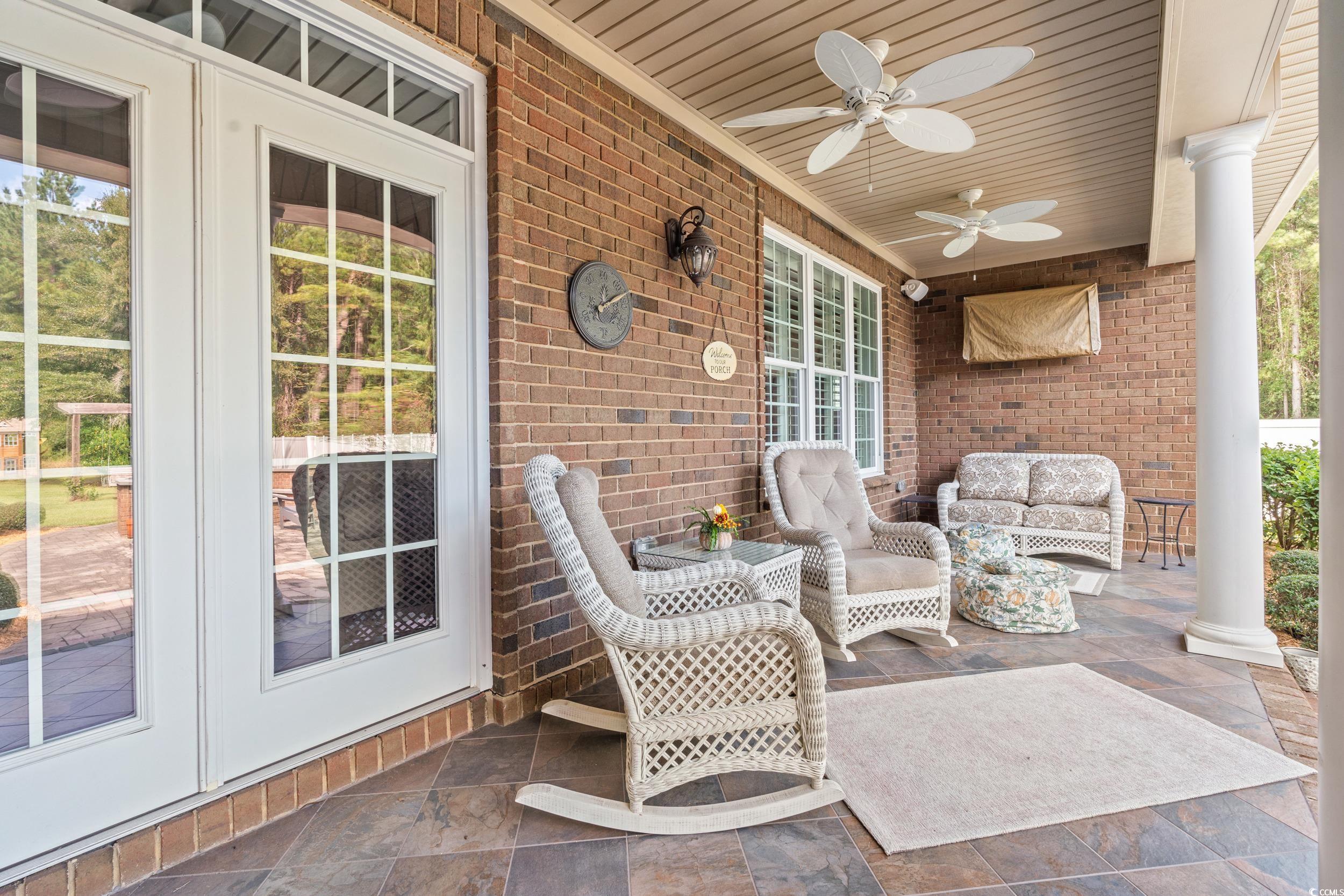 3609 Long Ave Extension Conway, SC 29526 - Photo 27 of 40 View of patio featuring an outdoor hangout area and ceiling fan