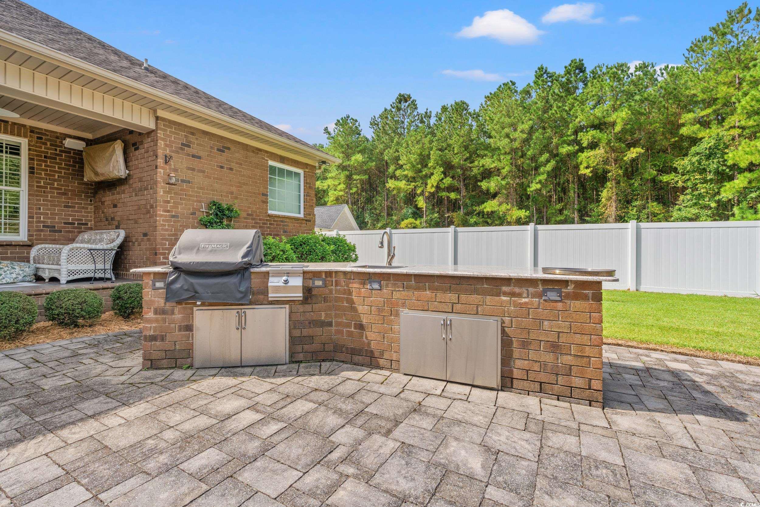 3609 Long Ave Extension Conway, SC 29526 - Photo 30 of 40 View of patio / terrace with exterior kitchen and a sink