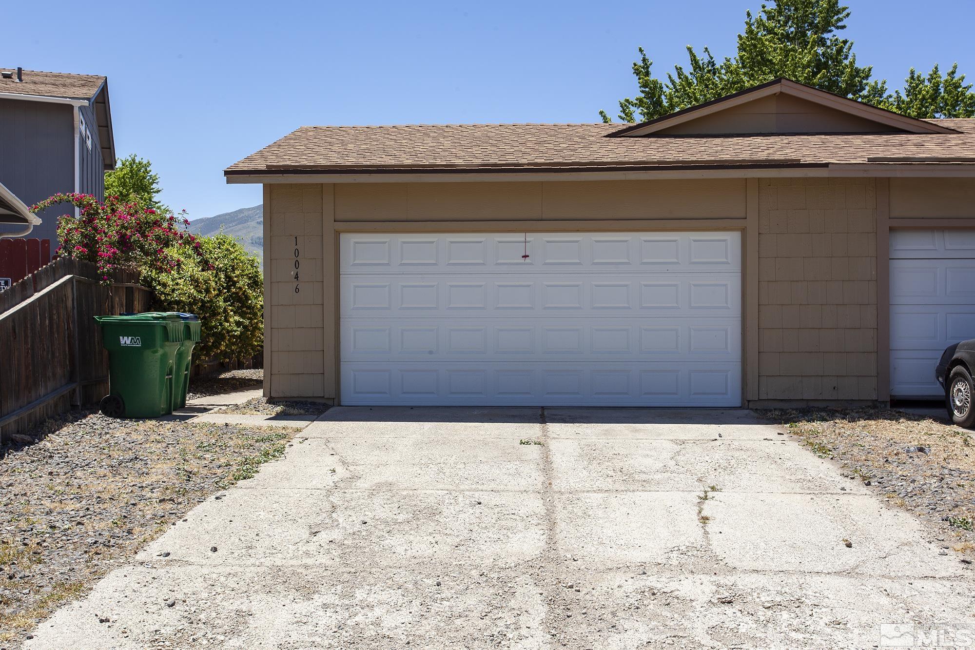 10046 Humite Lane Reno, NV 89506 - Photo 1 of 17 a front view of a house