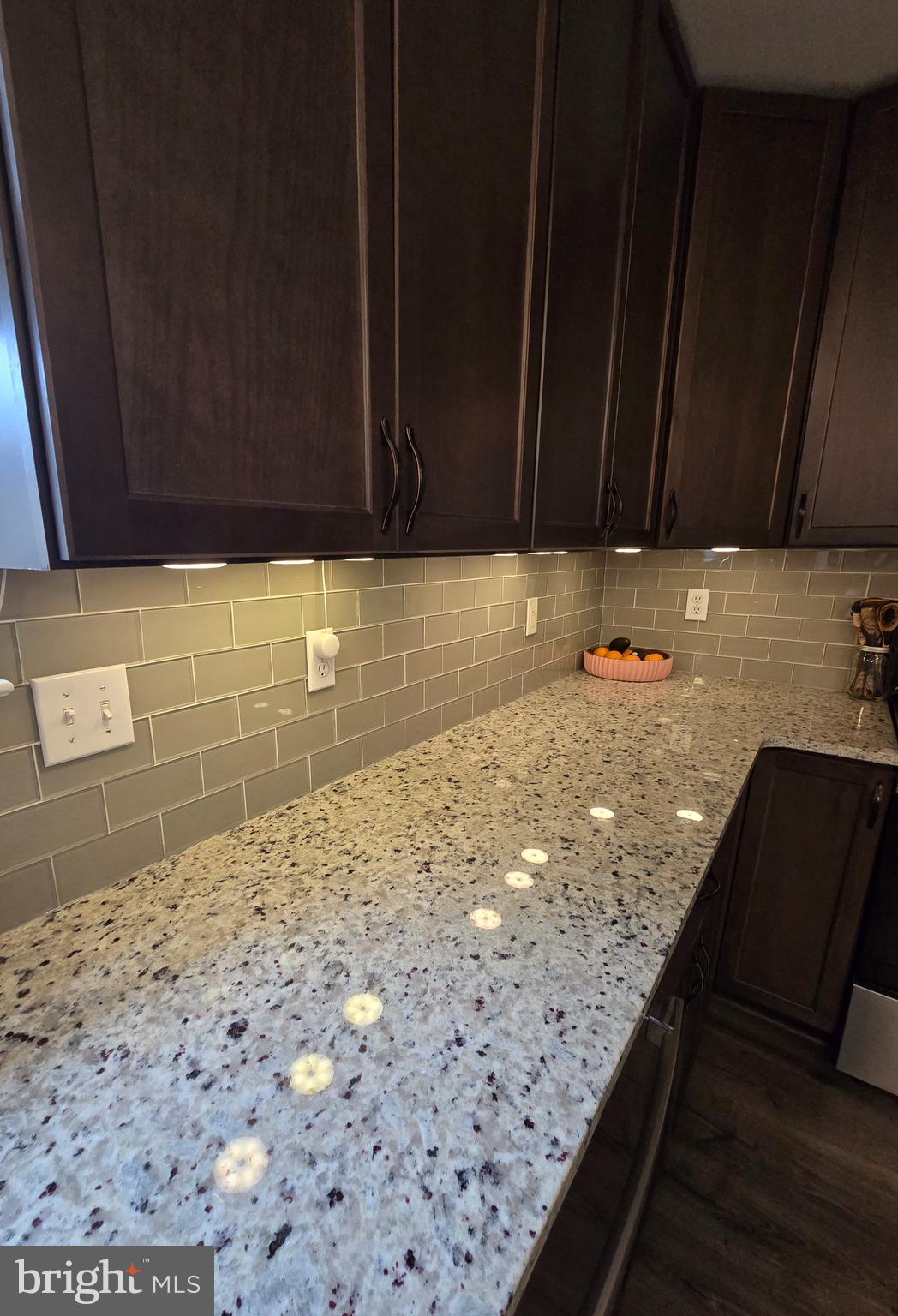 2 Kerrin Road Bear, DE 19701 - Photo 9 of 20 a view of a kitchen with wooden floor and a sink