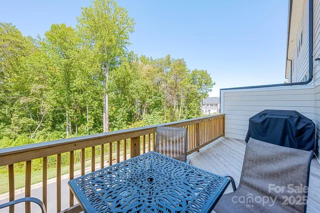 a view of balcony with furniture