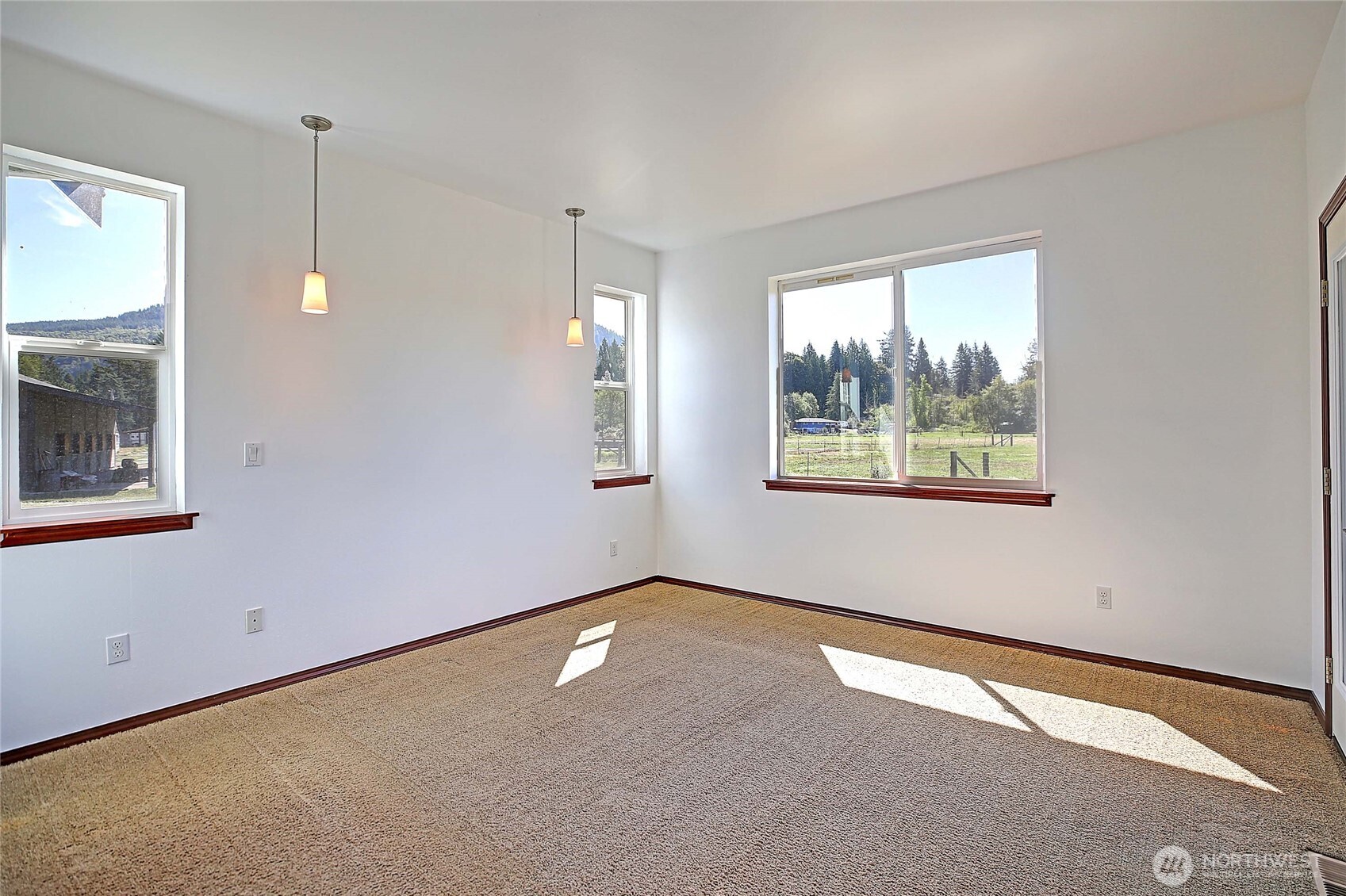 12631 State Rte 530 Northeast Arlington, WA 98223 - Photo 17 of 40 an empty room with windows