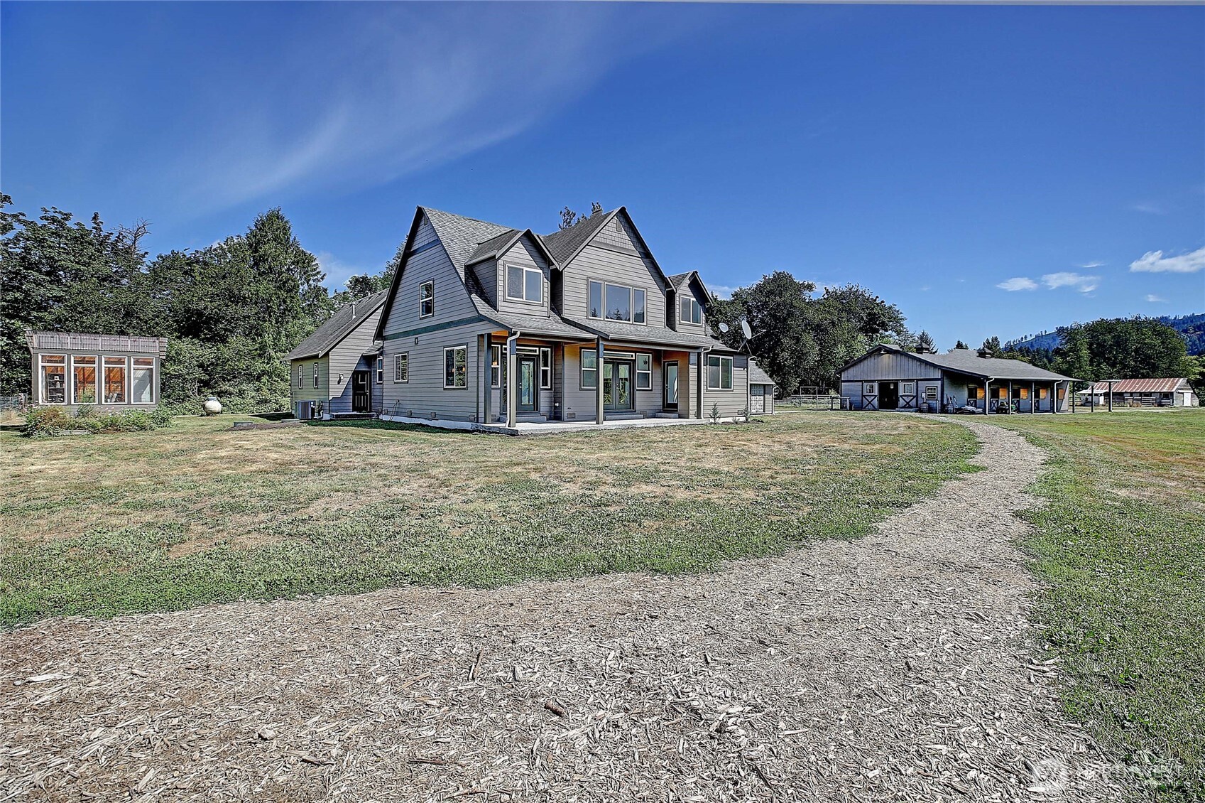 12631 State Rte 530 Northeast Arlington, WA 98223 - Photo 25 of 40 a view of a house with a yard