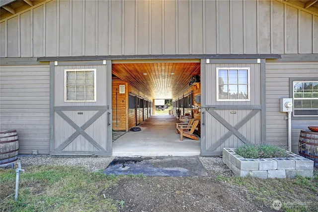 a view of a porch with wooden stairs